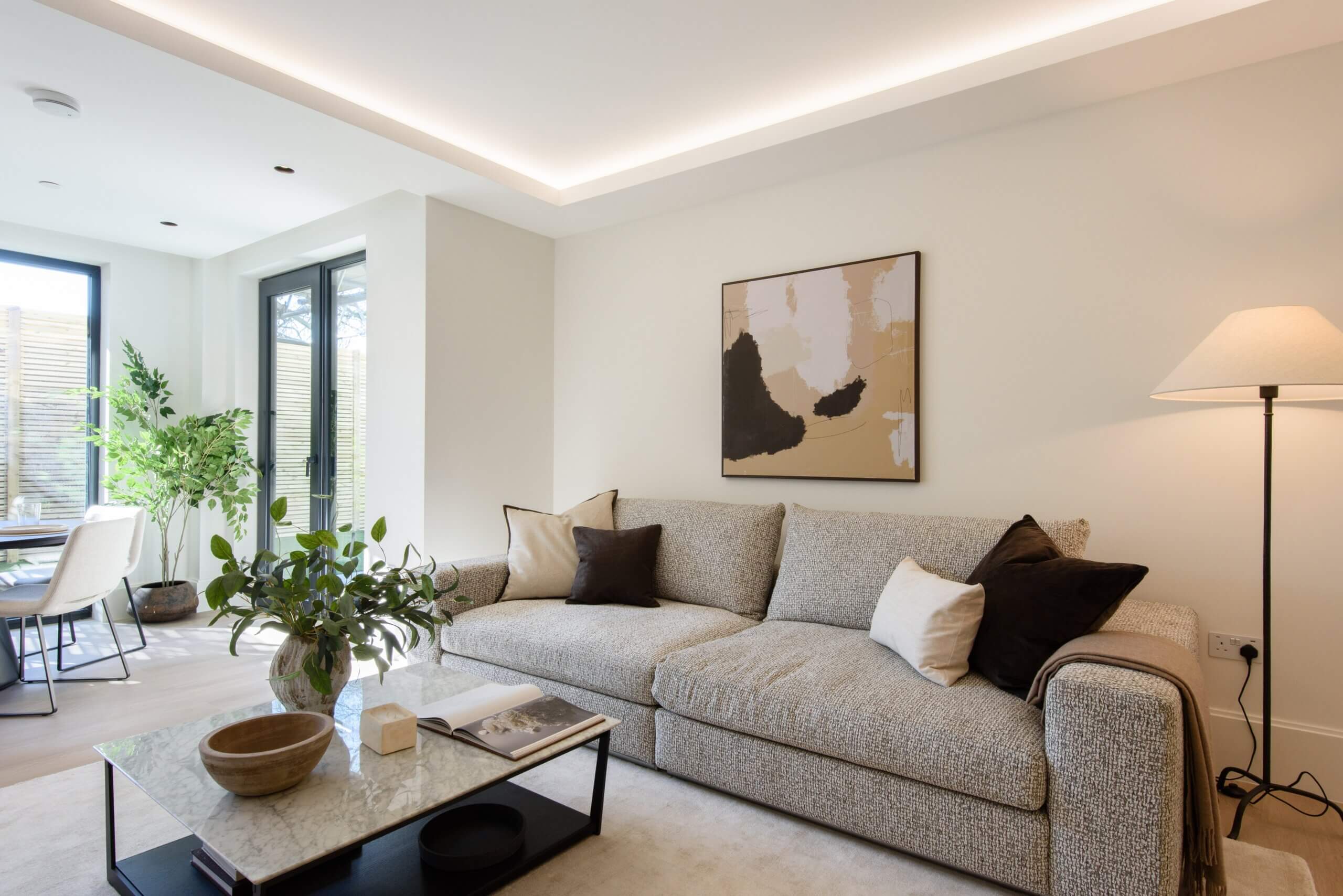 Contemporary living room and floor-to-ceiling windows at Artscene, East Acton Lane, London W3 – Haus Properties