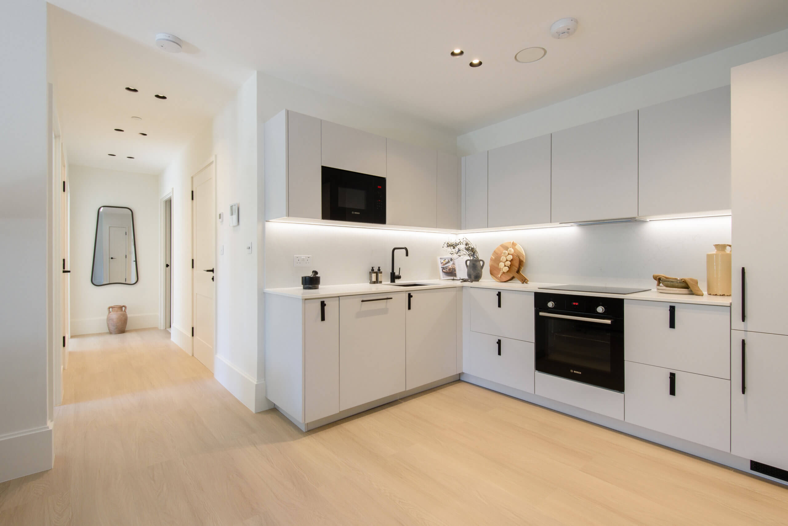 Modern kitchen with integrated appliances, at Artscene, East Acton Lane, London W3 – Haus Properties