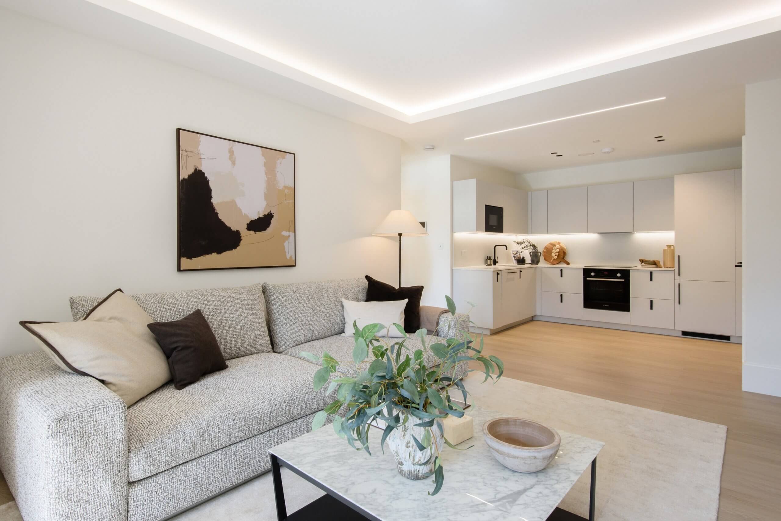 Open-plan living room and modern fitted kitchen at Artscene, East Acton Lane, London W3 – Haus Properties