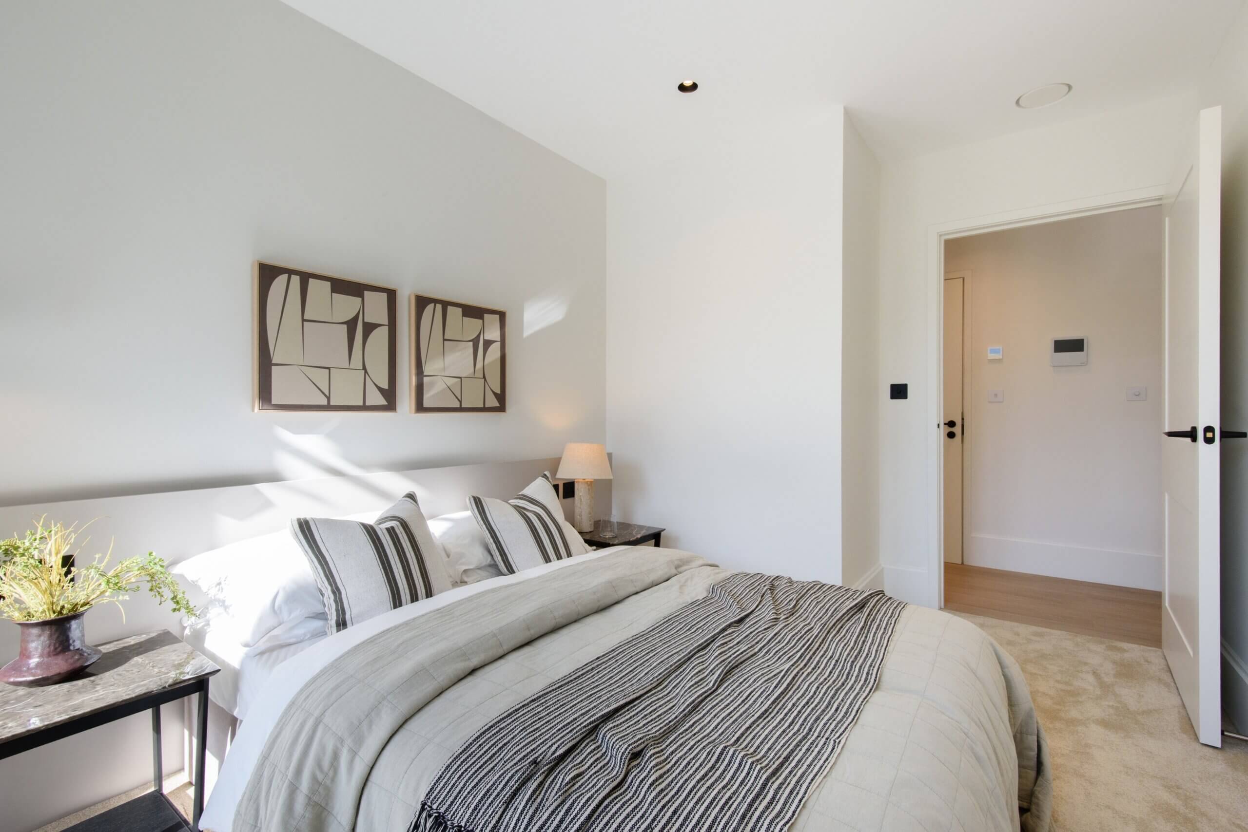 Elegant bedroom with neutral décor at Artscene, East Acton Lane, London W3 – Haus Properties